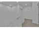 Bright, clean staircase leads to the upper level of the home at 600 N Carriage Hill Dr # 1164, Las Vegas, NV 89138