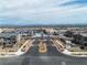 Street-level aerial view showcasing the new residential community featuring well-maintained landscaping at 600 N Carriage Hill Dr # 1164, Las Vegas, NV 89138