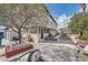 Spacious backyard featuring mature trees and large patio area for outdoor entertaining at 6710 Redwood Cir, Las Vegas, NV 89103