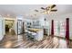 Bright kitchen featuring stainless appliances, stylish island with seating, and modern light fixtures at 6710 Redwood Cir, Las Vegas, NV 89103
