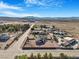 Wide aerial view of a rural community surrounded by desert landscape and distant mountains at 78 Siddall Ave, Las Vegas, NV 89183