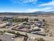 Wide aerial view of a rural community showing the surrounding desert landscape at 78 Siddall Ave, Las Vegas, NV 89183