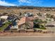 Expansive backyard with pool and desert landscaping, complemented by mountain views at 78 Siddall Ave, Las Vegas, NV 89183