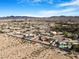 Wide aerial view of a rural desert community at 78 Siddall Ave, Las Vegas, NV 89183
