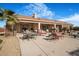Outdoor patio offers a shaded area for entertaining with plenty of space for dining and relaxing by the pool at 78 Siddall Ave, Las Vegas, NV 89183