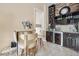 Entertain Gathering and friends in this home with a built in bar, custom cabinets and lots of storage at 78 Siddall Ave, Las Vegas, NV 89183