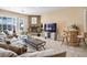 Cozy living room featuring a stone fireplace and ample seating at 78 Siddall Ave, Las Vegas, NV 89183