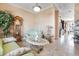 Comfortable living room area with vintage furniture and decor, plus access to kitchen and dining at 78 Siddall Ave, Las Vegas, NV 89183