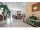 Open floorplan with tile flooring and a fireplace at 78 Siddall Ave, Las Vegas, NV 89183