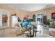 Cozy living area with a sofa and tile floors, filled with natural light at 78 Siddall Ave, Las Vegas, NV 89183