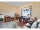 Comfortable home office space with fireplace and desk at 78 Siddall Ave, Las Vegas, NV 89183