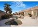 Backyard pool and spa offers a relaxing oasis, accented with mature palm trees and ample patio space at 78 Siddall Ave, Las Vegas, NV 89183