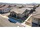 Well-manicured, single-story home with desert landscaping, captured from an aerial view at 783 Hibiscuss Blossom St, Henderson, NV 89011