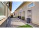 Paver patio and landscaping in a private backyard create a relaxing outdoor retreat at 783 Hibiscuss Blossom St, Henderson, NV 89011