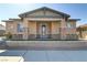 Charming single-story home with a covered porch and stone accents at 783 Hibiscuss Blossom St, Henderson, NV 89011