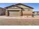 Picture of a home with a two-car garage and neutral stucco exterior at 783 Hibiscuss Blossom St, Henderson, NV 89011