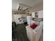 Functional kitchen with white appliances and laminate flooring at 8124 Kokoma Dr, Las Vegas, NV 89128