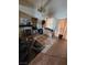 Cozy living room with tile flooring, fireplace, and vintage chandelier at 8124 Kokoma Dr, Las Vegas, NV 89128