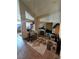 Living room featuring a fireplace, tile flooring, and open layout at 8124 Kokoma Dr, Las Vegas, NV 89128
