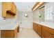 Bright bathroom featuring a soaking tub, stained glass window, and double sink vanity at 904 Hibiscus Ct, Henderson, NV 89011