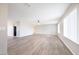 Bright, open-concept living room with modern floors and neutral walls, and lots of natural light at 904 Hibiscus Ct, Henderson, NV 89011