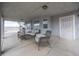 Covered patio with spiral staircase, furniture, and a view of the backyard at 904 Hibiscus Ct, Henderson, NV 89011