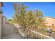 A charming balcony with view of trees, with a view of the neighborhood at 9117 Careful Canvas Ave, Las Vegas, NV 89149