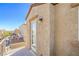 Charming balcony with stucco exterior, tile roof, and serene neighborhood view at 9117 Careful Canvas Ave, Las Vegas, NV 89149