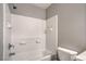 Bathroom with shower and tiled walls at 9117 Careful Canvas Ave, Las Vegas, NV 89149