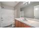 Bathroom featuring tile flooring, wood cabinets, large vanity, and a shower at 9117 Careful Canvas Ave, Las Vegas, NV 89149