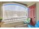 Balcony features privacy shade and seating area for outdoor relaxation at 950 Seven Hills Dr # 814, Henderson, NV 89052