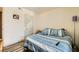 A bright bedroom with wood-look flooring and closet for storage at 950 Seven Hills Dr # 814, Henderson, NV 89052
