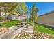 Outdoor grill area with stone picnic table, perfect for community gatherings and barbecues at 950 Seven Hills Dr # 814, Henderson, NV 89052