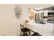 Breakfast bar overlooking updated kitchen with stainless steel appliances at 950 Seven Hills Dr # 814, Henderson, NV 89052