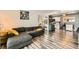 Open living room and kitchen area with modern finishes and wood flooring at 950 Seven Hills Dr # 814, Henderson, NV 89052