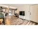Living room with modern décor, TV, and view of the adjoining kitchen at 950 Seven Hills Dr # 814, Henderson, NV 89052