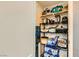Pantry with shelving for food storage and kitchen appliances at 950 Seven Hills Dr # 814, Henderson, NV 89052