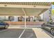 Designated parking spaces under a covered structure, providing shade and convenience at 950 Seven Hills Dr # 814, Henderson, NV 89052