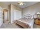 Cozy bedroom featuring neutral carpet, an accent wall, and double door closet for maximum storage at 97 Zimmerman St, Henderson, NV 89002
