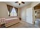 Bedroom with neutral walls, carpet, natural light, and view to hallway at 97 Zimmerman St, Henderson, NV 89002