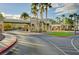 Gated community entrance with palm trees and well-maintained landscaping at 97 Zimmerman St, Henderson, NV 89002