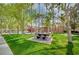 Lush green park area featuring walking paths, picnic tables, and a playground at 97 Zimmerman St, Henderson, NV 89002