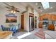 Bright kitchen features stainless steel appliances and a breakfast nook with bright blue chairs at 97 Zimmerman St, Henderson, NV 89002