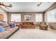 Comfortable living room with carpet, ceiling fans and plenty of natural light at 97 Zimmerman St, Henderson, NV 89002