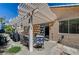 Outdoor space offers a covered patio with stone accents and access to indoor living areas at 97 Zimmerman St, Henderson, NV 89002