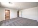 Spacious bedroom featuring plush carpeting and ensuite bathroom at 1027 Gentle Swan St # 689, Henderson, NV 89011