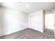 Bedroom with carpet, closet with sliding doors, and view of the entryway at 1027 Gentle Swan St # 689, Henderson, NV 89011