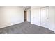 Neutral bedroom with carpet flooring and sliding door closet at 1027 Gentle Swan St # 689, Henderson, NV 89011