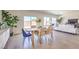 Open dining room area with backyard access, natural light, and tile flooring at 1027 Gentle Swan St # 689, Henderson, NV 89011