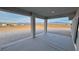 Spacious covered patio featuring scenic views of the surrounding desert landscape and mountains at 1131 Lupin St, Pahrump, NV 89048